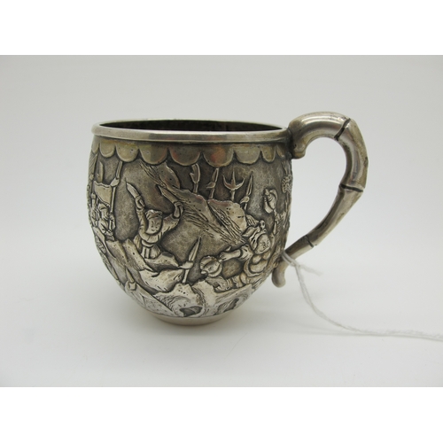 15 - A Chinese Cup, allover detailed in relief with battle scene, bamboo style handle, stamped character ... 