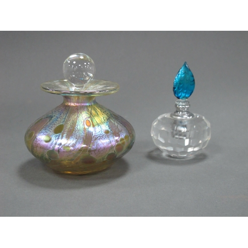 1016 - A Modern Iridescent Glass Scent Bottle and Stopper, of compressed globular form, 9cm high and a face... 