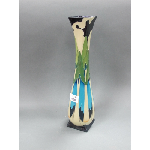 1030 - A Moorcroft Pottery Vase, of waisted form with square base, decorated in the 'Moonlit Firs' pattern ... 