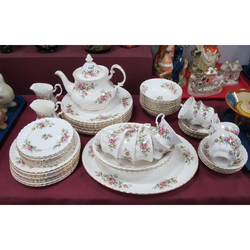 1035 - Royal Albert 'Moss Rose' Pattern Tea Ware, including teapot and seven dinner plates, approximately f... 