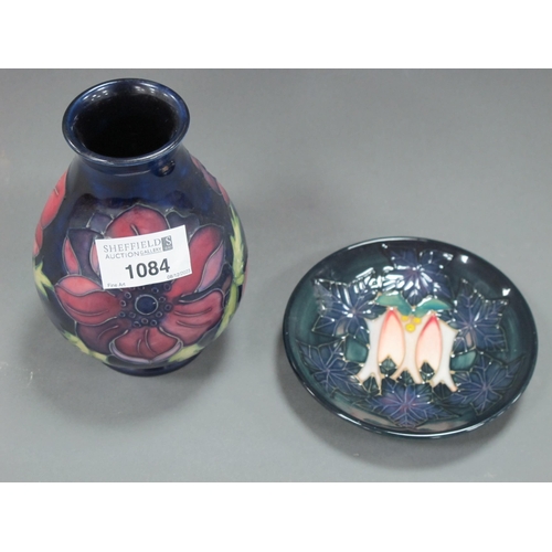 1084 - A Moorcroft PotteryVase, painted in the 'Anemone' pattern against a deep blue ground, ovoid body, 13... 