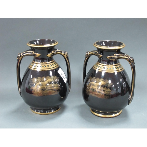 1094 - A Pair of Late XIX Century Pottery Vases, of two-handled ovoid form, the black grounds decorated in ... 