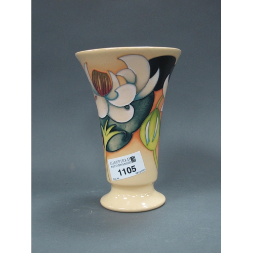 1105 - A Moorcroft Pottery Vase, of fanned form, decorated with a floral pattern on peach ground, 'Trial 7-... 