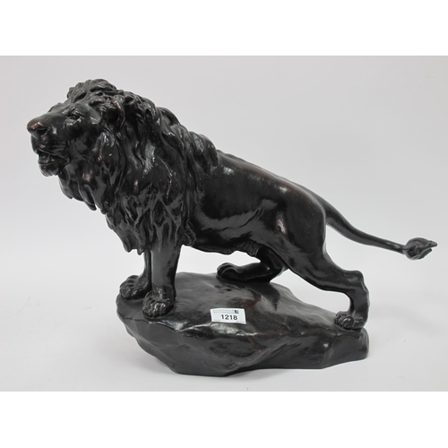 1218 - An Early XX Century Bronzed Model of a Lion Standing on a Rocky Base, signed Gyongy Vastagh, 50cm lo... 