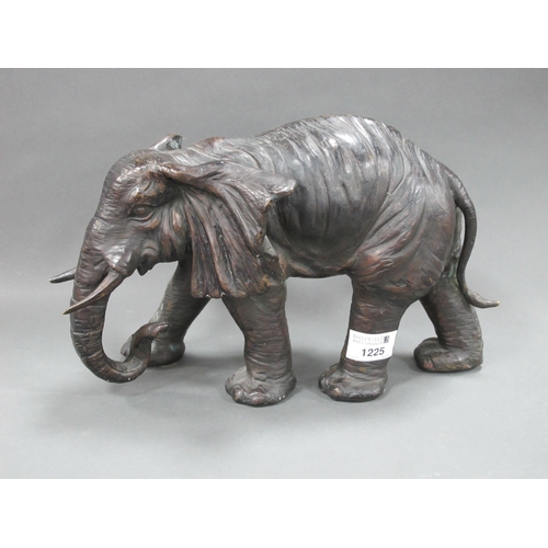 1225 - A XX Century Bronzed Model of a Standing Elephant, 29.5cm long.