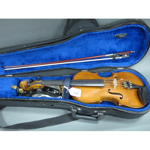 1240 - An Early XX Century Violin, with two-piece back, no label, with bow and clip attachment, in case, le... 