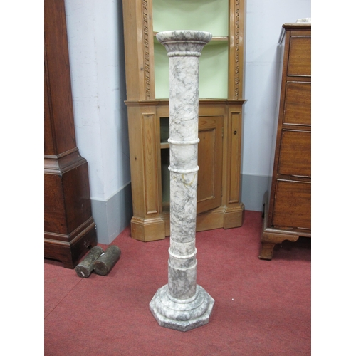 1580 - A Late XIX Century Grey Variegated Marble Pedestal, the canted square top raised on a ringed column ... 