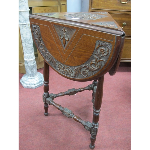 1581 - An Early XX Century Walnut Occasional Table, the top carved with a coat of arms (Lord Baltimore's Ar... 