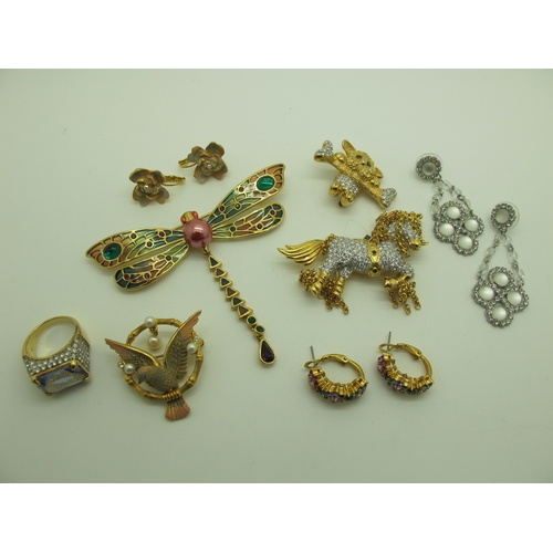 186 - A Collection of Modern Costume Jewellery, to include Joan Rivers earrings, brooches, ring, Puccini b... 