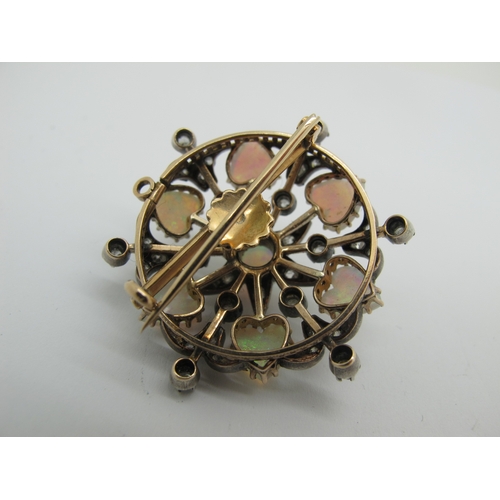 75 - A Victorian Opal and Diamond Set Brooch, of openwork design set with central cabochon and heart shap... 