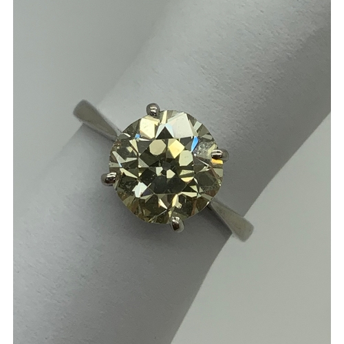 136 - A Large 18ct Gold Single Stone Diamond Ring, the (chipped) old brilliant cut stone four claw set (fi... 