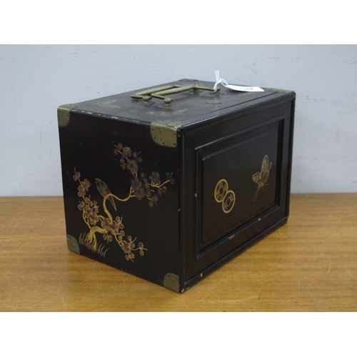 1167 - An Early XX Century Chinese Mah Jong Set, in a lacquered black cabinet with gilt decoration, the lif... 