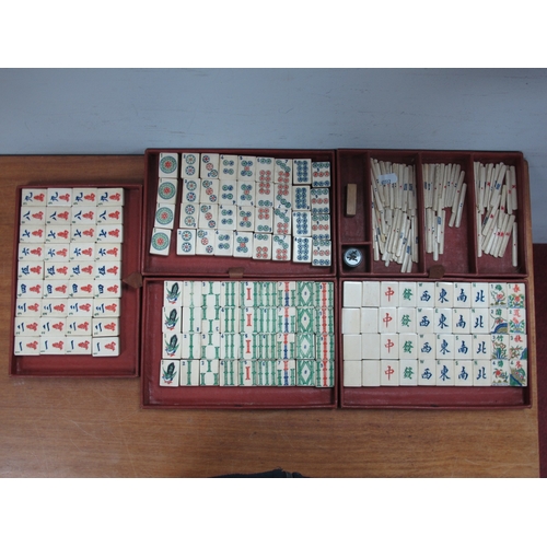 1170 - An Early XX Century Mah Jong Set, the leather travelling case with five lift-out trays containing bo... 