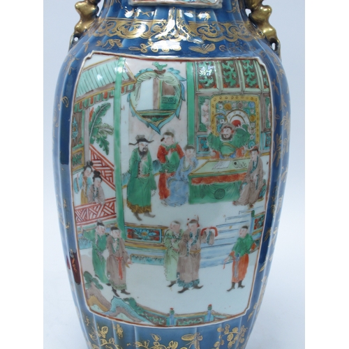 1163 - A XIX Century Chinese Porcelain Blue Ground Famille Verte Vase, painted with two panels of figures i... 