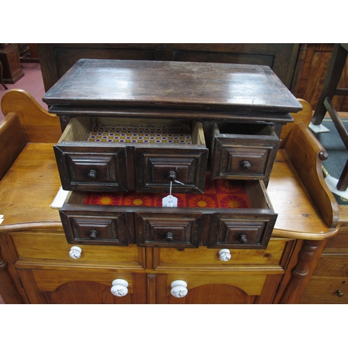 1526 - A Late XVII/Early XVIII Century Continental Table Top Cabinet, possibly walnut, with moulded front d... 