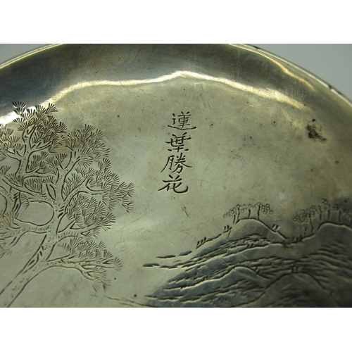 16 - A Chinese Circular Dish, with engraved rural dwelling, on plain rim base, stamped character mark, 10... 