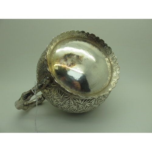 17 - A Chinese Three Piece Tea Set, each allover detailed in relief with bamboo (indistinctly stamped cha... 