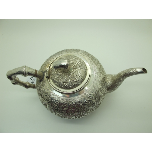 17 - A Chinese Three Piece Tea Set, each allover detailed in relief with bamboo (indistinctly stamped cha... 