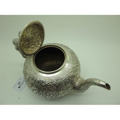 17 - A Chinese Three Piece Tea Set, each allover detailed in relief with bamboo (indistinctly stamped cha... 