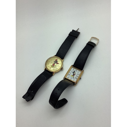 136 - A Novelty Mickey Mouse Gent's Wristwatch, the gilt dial featuring Mickey Mouse with moving arms and ... 