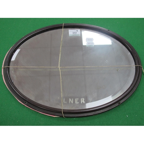 342 - An original LNER oval carriage mirror with bakelite surround.