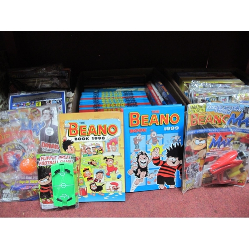 1037 - The Beano Books, annuals, and Beano Max with attached toys/gifts:- three Boxes.