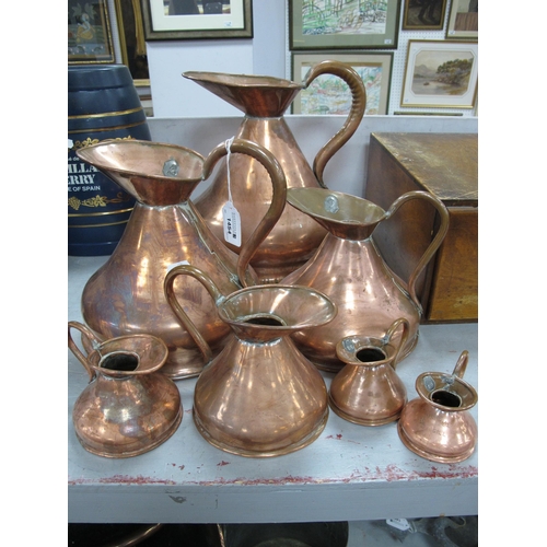 1454 - Seven Graduated Copper Jugs, the largest 1 gallon, 29cm (7).