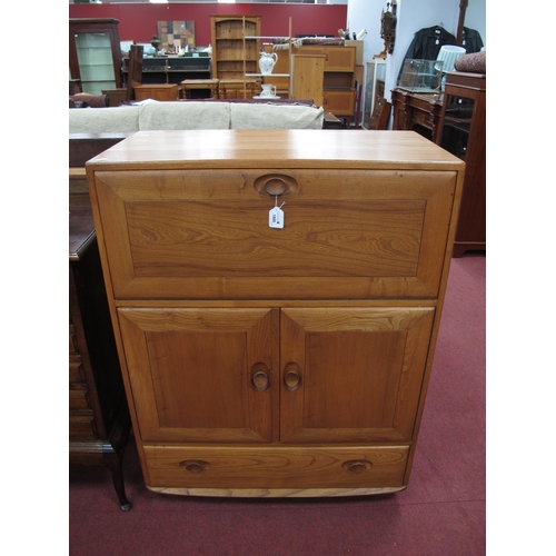 1600 - Ercol Cabinet, with a fall front over twin cupboard doors, long drawer, on castors, 82cm wide x 110c... 