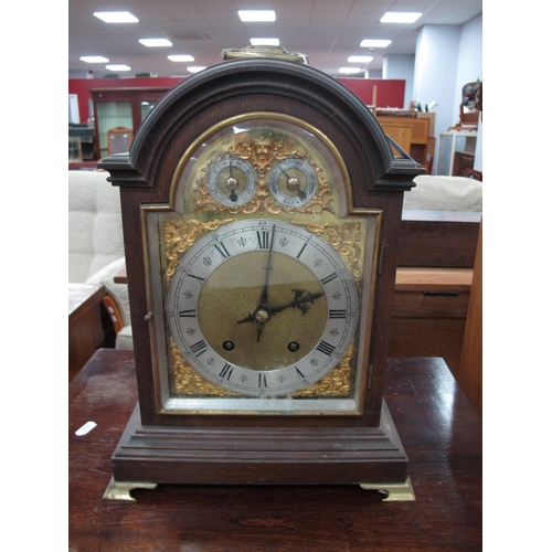 1601 - Early XX Century Oak Mantel Clock, with a brass carrying handle, arched top, silver chapter ring, Ro... 