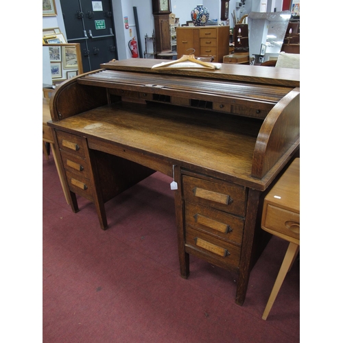 1604 - Early XX Century Oak Roll Top Desk, with a tambour front, twin single drawers, pedestals with three ... 