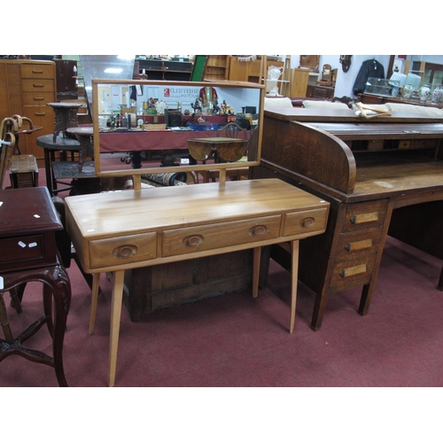 1605 - Ercol Dressing Table, with a raised mirror, three drawers on tapering supports, 114cm wide, 125cm hi... 