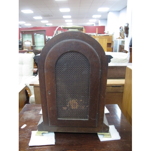 1601 - Early XX Century Oak Mantel Clock, with a brass carrying handle, arched top, silver chapter ring, Ro... 