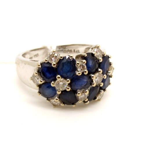 225 - A Modern Sapphire and Diamond Set Dress Ring, of bombé style, claw set to the front with oval cut sa... 