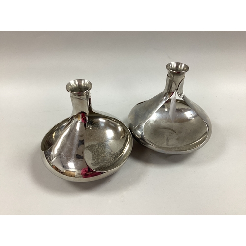 89 - Georg Jensen; A Pair of Modernist Style Candle Holders, each of sinuous design with dish base, 14.5c... 