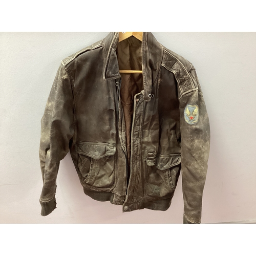 718 - A United States Air Force Mid XX Century Brown Leather Jacket, possibly Korean theatre of war, one c... 