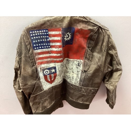 718 - A United States Air Force Mid XX Century Brown Leather Jacket, possibly Korean theatre of war, one c... 