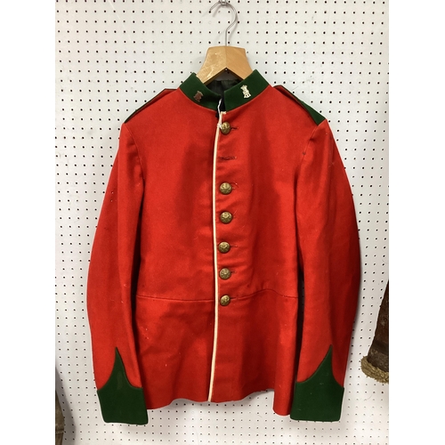 719 - British Army Green Howards dress jacket with regimental lapel badges (bottom of jacket has been trim... 