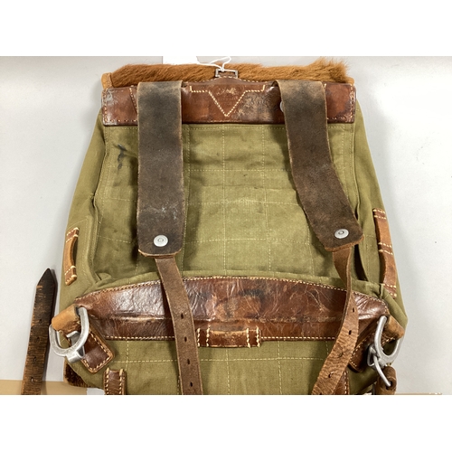 761 - WWII German Army canvas pony fur M34 Tornister backpack with manufacturer mark and date stamp 1938.