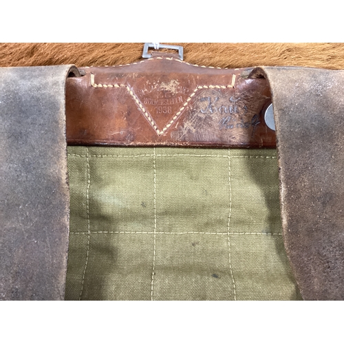 761 - WWII German Army canvas pony fur M34 Tornister backpack with manufacturer mark and date stamp 1938.