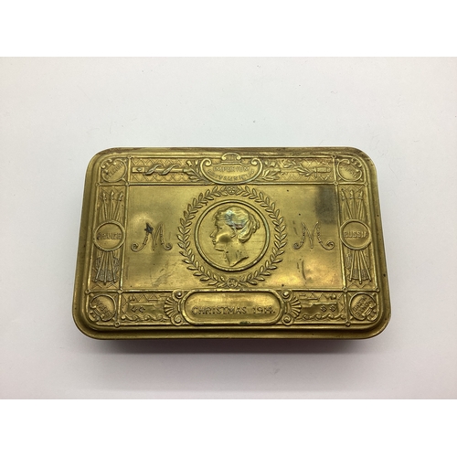 801 - WW1 1914 Princess Mary gift fund brass box with contents comprising of cigarette and tobacco packets... 