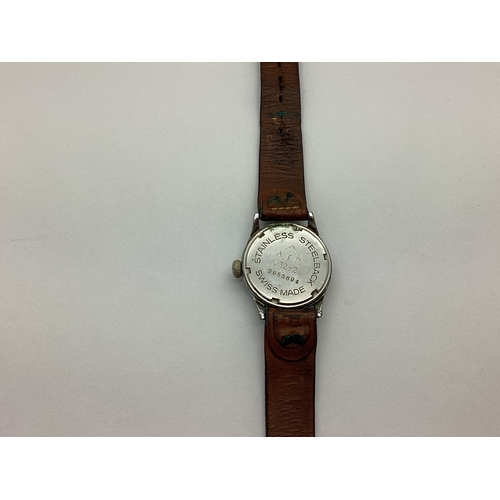 817 - WWII British Army Trade Pattern Moeris Watch With Leather Strap, marked on the rear of the case with... 