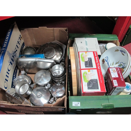 1037 - A quantity of stainless steel ware to include teapot, jugs, toast rack, bowls, napkin rings, and qua... 