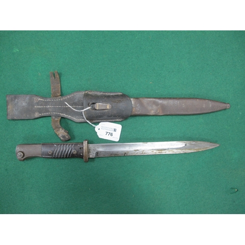 776 - WW2 German K98 bayonet with markings 1850 42 c u e(?) to blade, complete with scabbard (some deforma... 