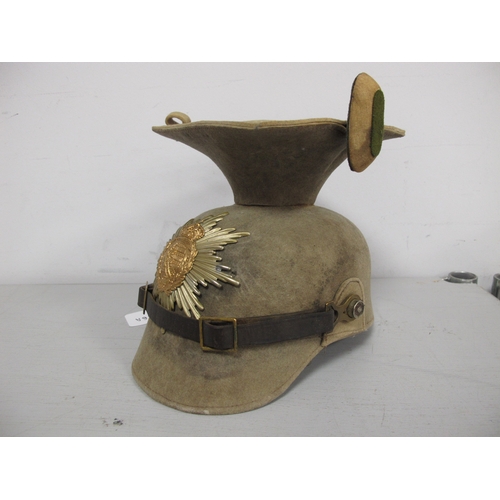 796A - A WWI German Saxon Felt Czapka, with Saxon helmet plate to centre, helmet is complete with Reichs co... 