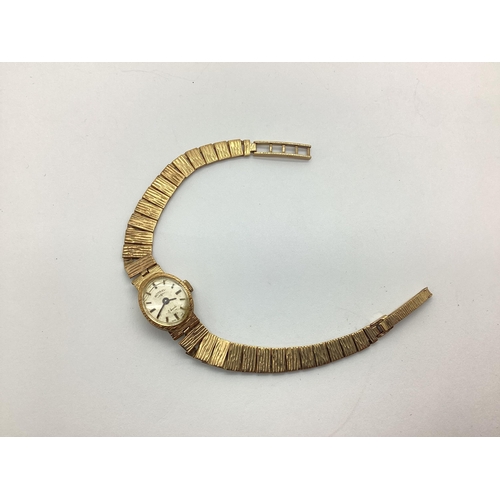 120 - Rotary; A 9ct Gold Cased Ladies Wristwatch, to integral textured tapering bracelet with 9ct gold cla... 