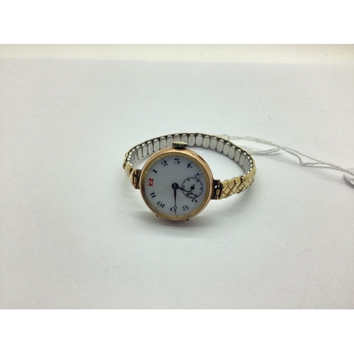 122 - A Vintage 9ct Gold Cased Ladies Wristwatch, the (cracked) white enamel dial with black and red Arabi... 