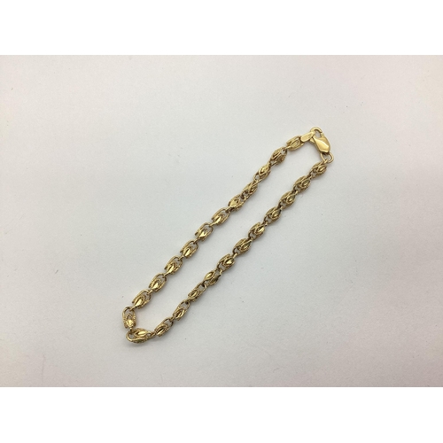 185 - A Modern 9ct Gold Fancy Link Bracelet, (4.8grams).