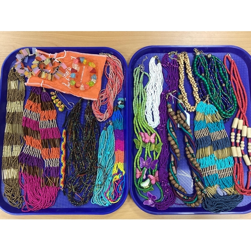 56 - A Collection of Assorted Multi Strand Bead Necklaces, etc :- Two Trays