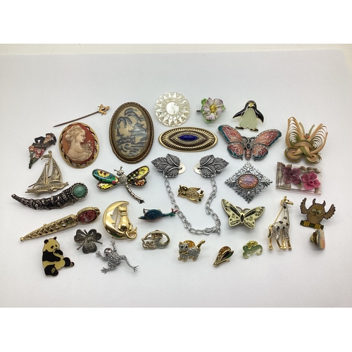 77 - Assorted Costume Brooches, including stitched, mother of pearl, cameo style, Miracle style, lucite e... 