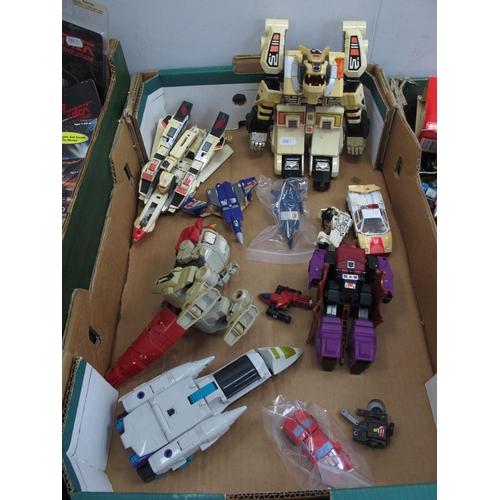 304 - A collection of predominantly circa 1980's G1 Transformers including Bandai Jet Fire Autobot, small ... 